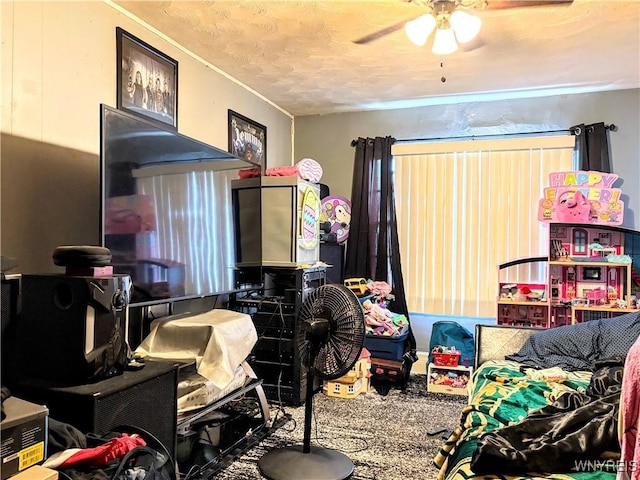 134 Hamburg St, Buffalo, NY 14204 - game room with a ceiling fan, a textured ceiling, carpet floors, and crown molding