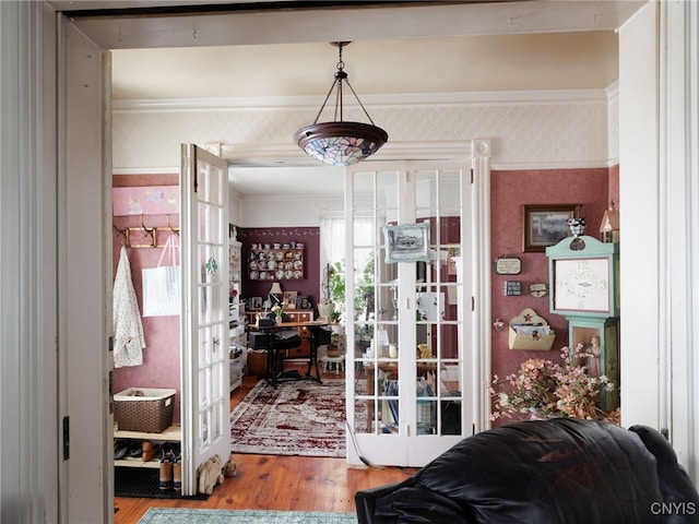 303 Mullin St, Watertown-City, NY 13601 - doorway to outside with french doors, wallpapered walls, wood finished floors, an office area, and ornamental molding