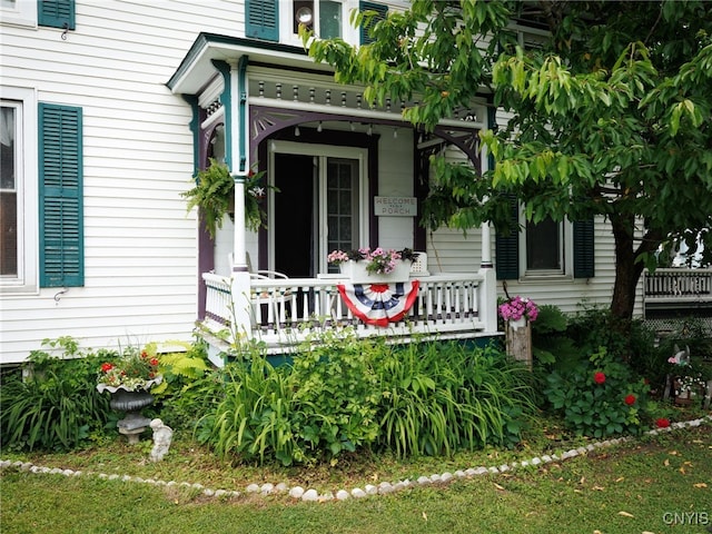303 Mullin St, Watertown-City, NY 13601 - property entrance with a porch