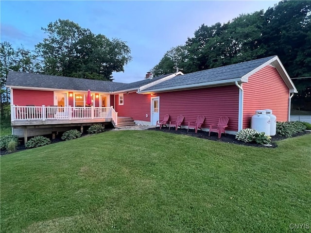 412 County Route 62, Sandy Creek, NY 13142 - back of house featuring a deck, a yard, and a shingled roof