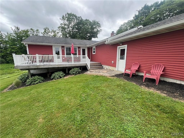 412 County Route 62, Sandy Creek, NY 13142 - rear view of house featuring a lawn, a wooden deck, and a chimney
