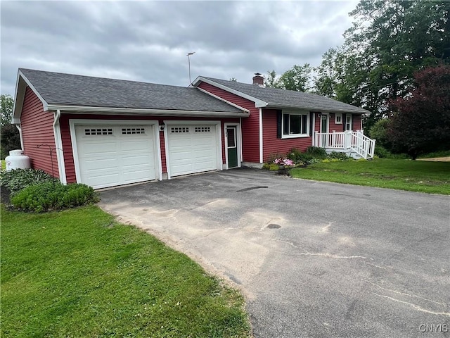 412 County Route 62, Sandy Creek, NY 13142 - single story home with asphalt driveway, a garage, a chimney, a front lawn, and roof with shingles