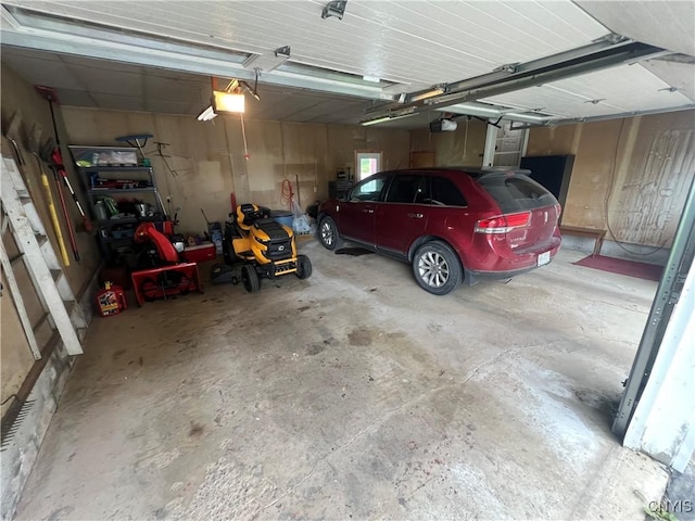 412 County Route 62, Sandy Creek, NY 13142 - garage featuring a garage door opener