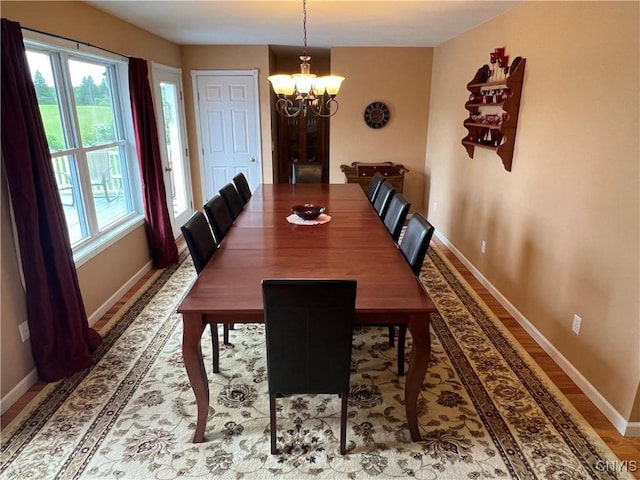 412 County Route 62, Sandy Creek, NY 13142 - dining space featuring a chandelier and wood finished floors