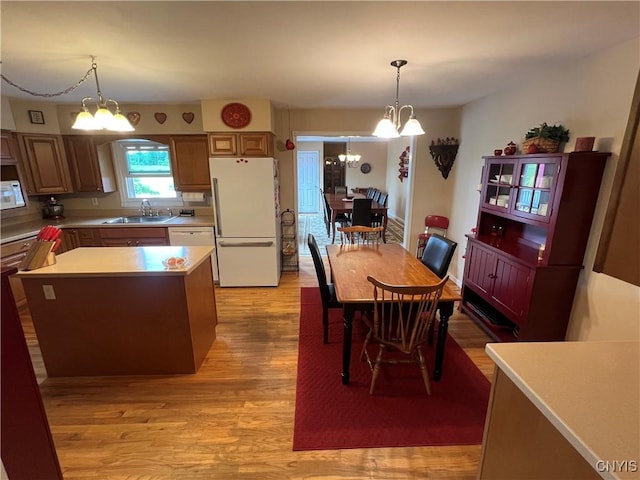 412 County Route 62, Sandy Creek, NY 13142 - dining area featuring a chandelier and light wood-style flooring