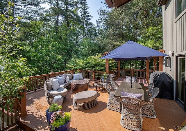 4458 E Lake Rd, Cazenovia, NY 13035 - wooden terrace featuring an outdoor hangout area, a grill, outdoor dining space, and view of scattered trees