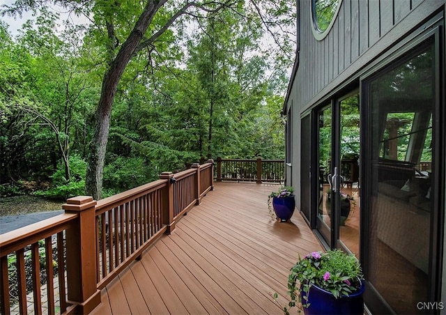 4458 E Lake Rd, Cazenovia, NY 13035 - wooden terrace with a forest view