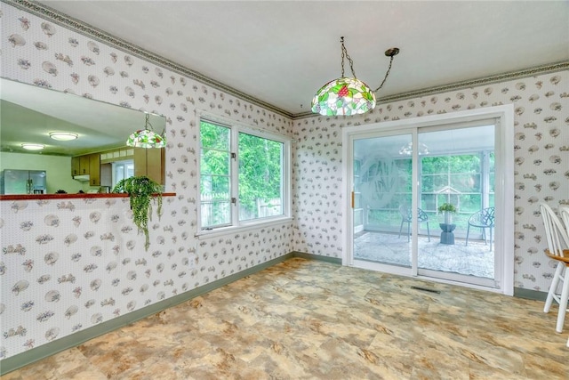 1541 Shoecraft Rd, Penfield, NY 14526 - unfurnished dining area with wallpapered walls and ornamental molding
