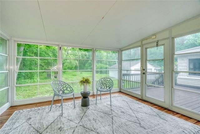 1541 Shoecraft Rd, Penfield, NY 14526 - sunroom featuring vaulted ceiling and wood finished floors