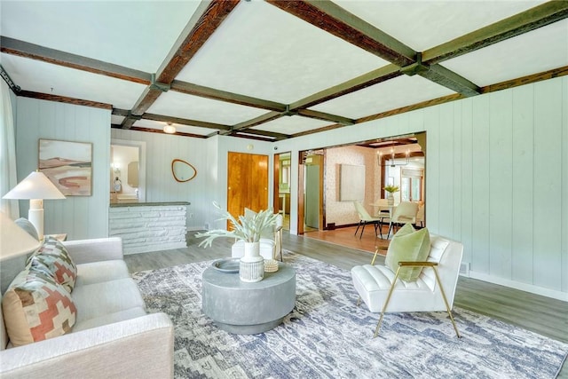 1541 Shoecraft Rd, Penfield, NY 14526 - living room with coffered ceiling, wood finished floors, beam ceiling, and wooden walls