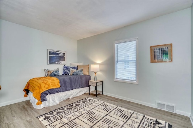 1541 Shoecraft Rd, Penfield, NY 14526 - bedroom with wood finished floors and baseboards