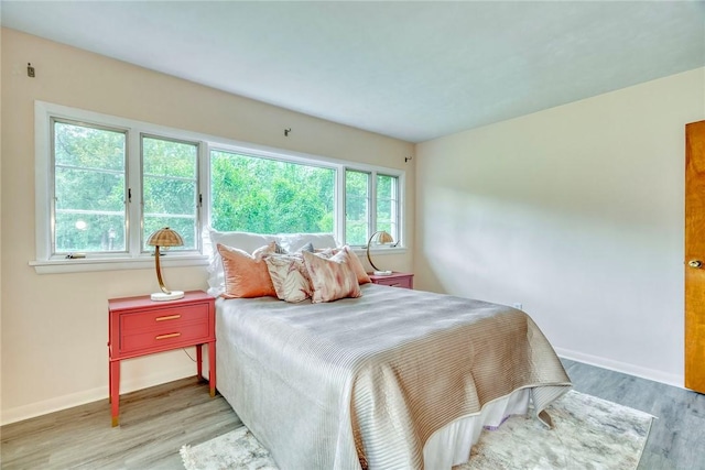 1541 Shoecraft Rd, Penfield, NY 14526 - bedroom with light wood-style floors and baseboards