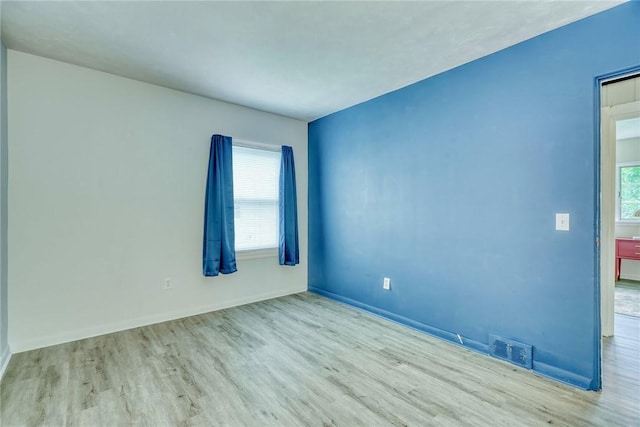 1541 Shoecraft Rd, Penfield, NY 14526 - spare room with wood finished floors and baseboards