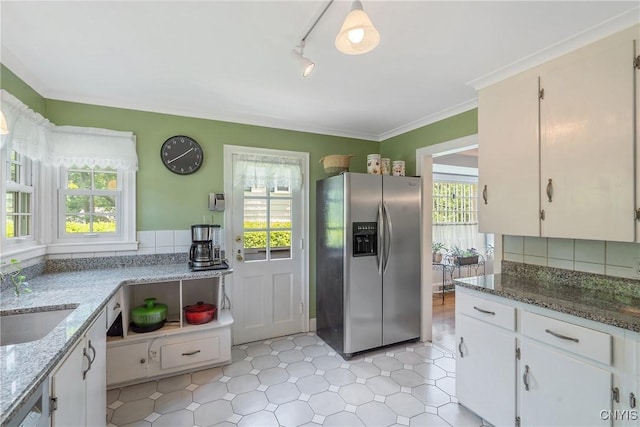 2 Morton Rd, Dewitt, NY 13214 - kitchen with stainless steel refrigerator with ice dispenser, light stone counters, white cabinets, decorative backsplash, and track lighting