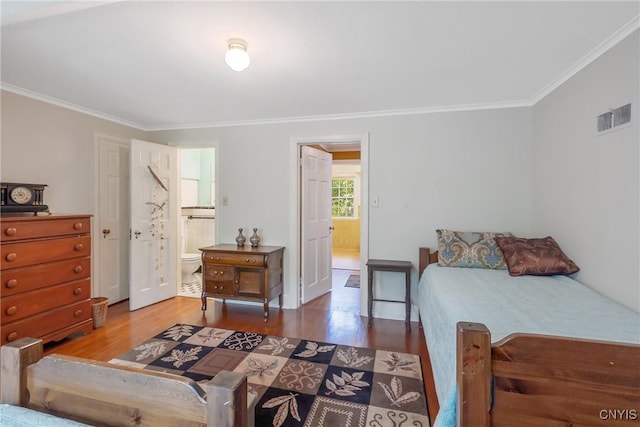 2 Morton Rd, Dewitt, NY 13214 - bedroom with wood finished floors, ornamental molding, and ensuite bathroom