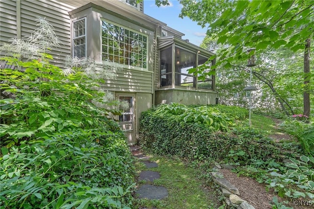 2 Morton Rd, Dewitt, NY 13214 - view of side of home with a sunroom