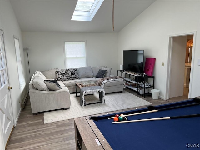10 Montgomery St, Hamilton, NY 13346 - living room with a skylight, lofted ceiling, wood finished floors, and billiards table