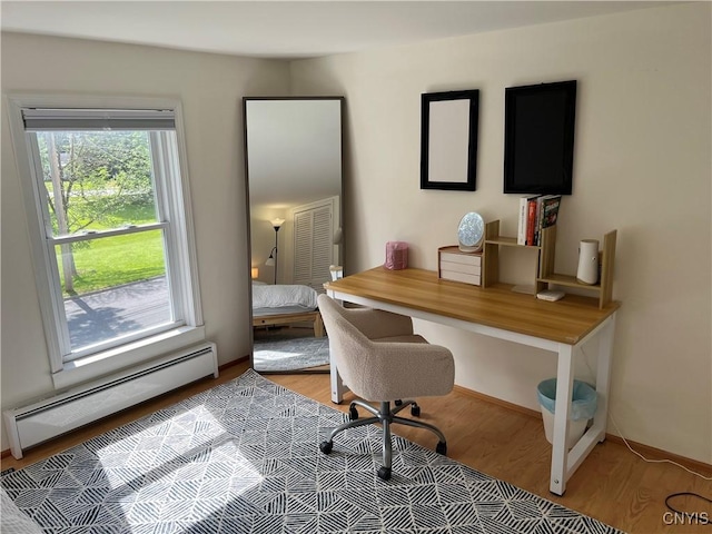 10 Montgomery St, Hamilton, NY 13346 - office featuring baseboard heating and light wood finished floors