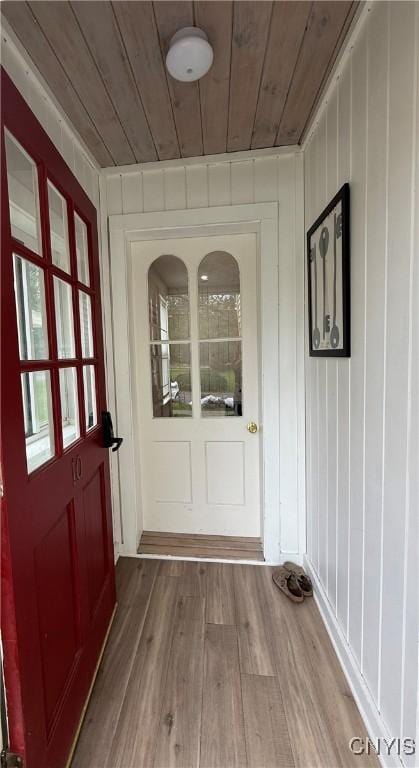 10 Montgomery St, Hamilton, NY 13346 - doorway to outside featuring wooden ceiling and wood finished floors