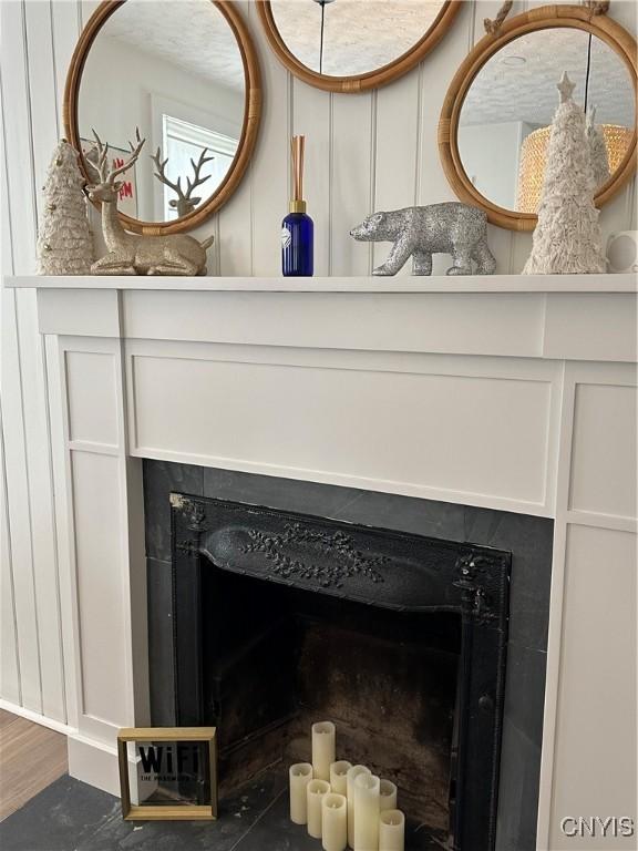 10 Montgomery St, Hamilton, NY 13346 - detailed view of a fireplace and wood finished floors