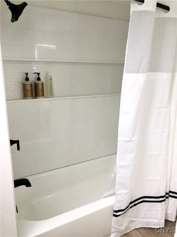 10 Montgomery St, Hamilton, NY 13346 - full bathroom featuring shower / bath combo with shower curtain