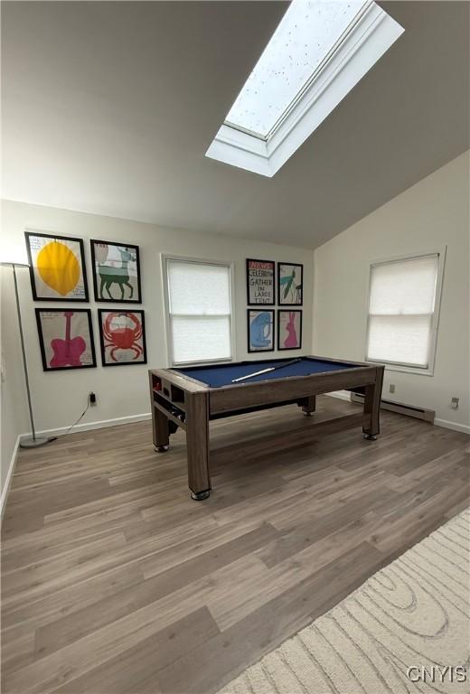 10 Montgomery St, Hamilton, NY 13346 - recreation room featuring a skylight, pool table, lofted ceiling, and light wood finished floors
