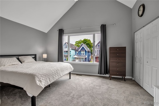 184 14th St, Buffalo, NY 14213 - carpeted bedroom with a closet and high vaulted ceiling