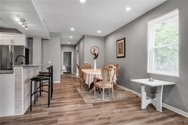 184 14th St, Buffalo, NY 14213 - dining room featuring light wood-type flooring and recessed lighting