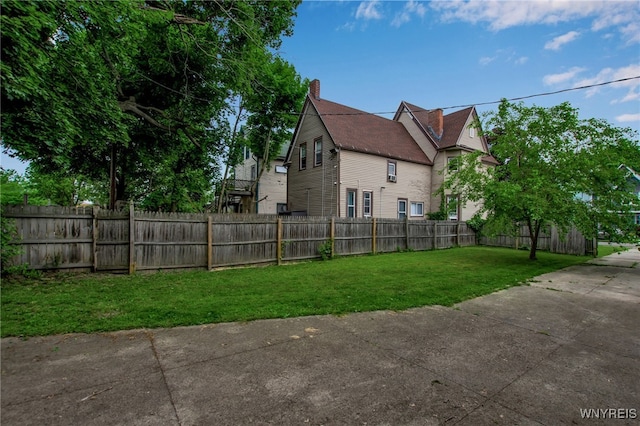 184 14th St, Buffalo, NY 14213 - view of property exterior with a chimney