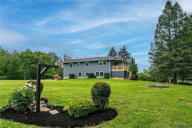 2540 Snyder Rd, Orangeville, NY 14167 - rear view of house with a yard, stairs, and a wooden deck