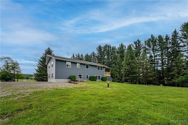 2540 Snyder Rd, Orangeville, NY 14167 - rear view of house featuring a chimney and a yard