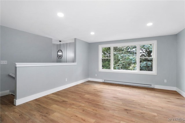 2540 Snyder Rd, Orangeville, NY 14167 - empty room with baseboard heating, wood finished floors, and recessed lighting
