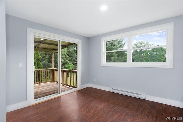 2540 Snyder Rd, Orangeville, NY 14167 - unfurnished room with a baseboard radiator, healthy amount of natural light, and dark wood finished floors