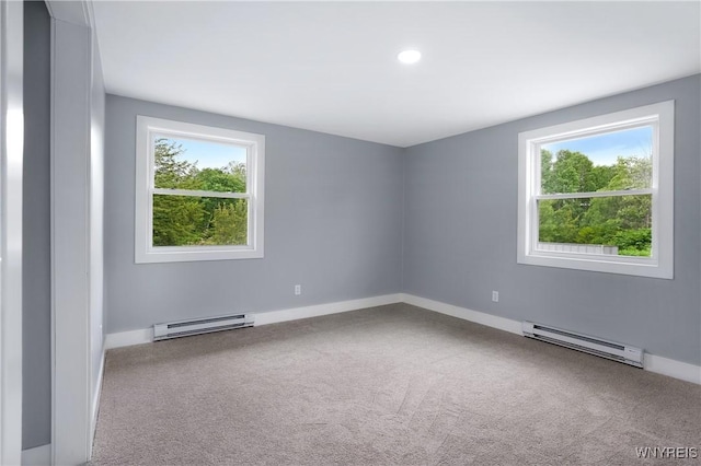 2540 Snyder Rd, Orangeville, NY 14167 - spare room featuring a baseboard radiator, carpet flooring, and recessed lighting