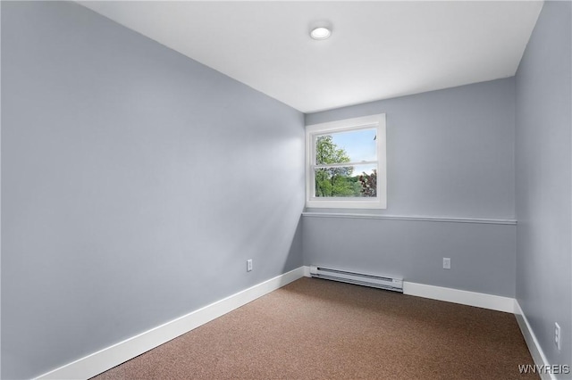 2540 Snyder Rd, Orangeville, NY 14167 - carpeted empty room featuring a baseboard heating unit and baseboards
