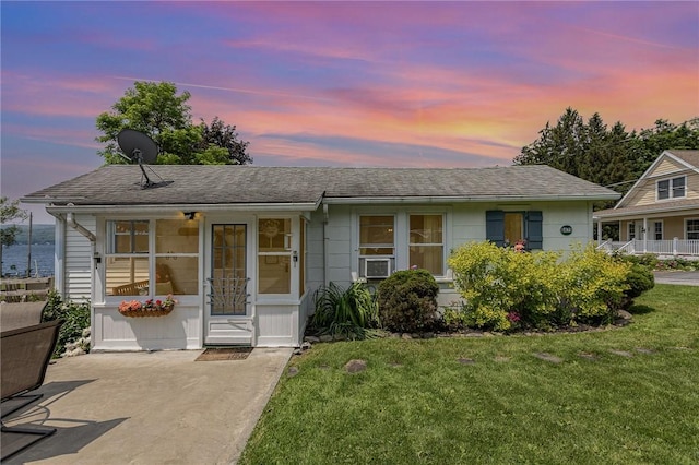 8479 Princeton St, Richmond, NY 14471 - ranch-style house with a front yard, cooling unit, and roof with shingles