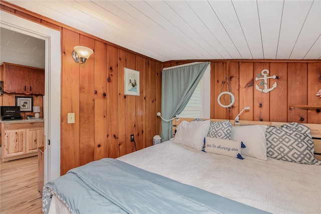 8479 Princeton St, Richmond, NY 14471 - bedroom with wooden walls and light wood-style flooring