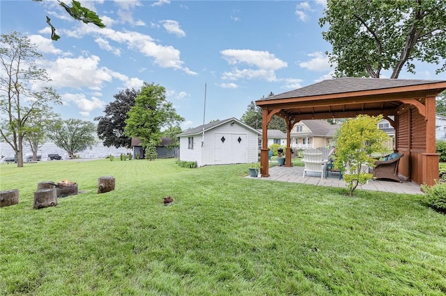 8479 Princeton St, Richmond, NY 14471 - view of green lawn with a gazebo, a patio area, and an outdoor structure
