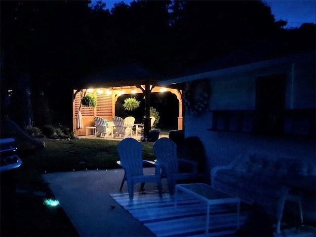 8479 Princeton St, Richmond, NY 14471 - patio at night with a patio area and a gazebo
