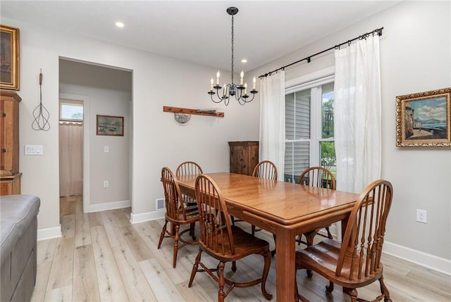 89 Steeplechase, Geneseo, NY 14454 - dining room with light wood-style floors, a chandelier, and recessed lighting