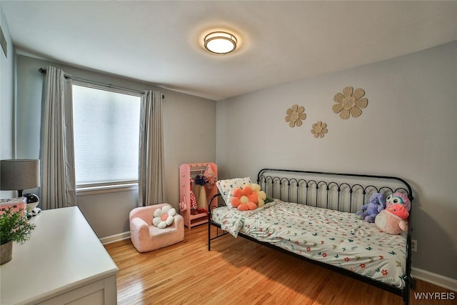 37 Rosary Blvd, Cheektowaga, NY 14225 - bedroom with wood finished floors and multiple windows