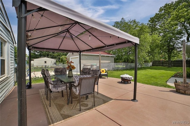 37 Rosary Blvd, Cheektowaga, NY 14225 - fenced backyard featuring outdoor dining space, a patio, and an outdoor structure