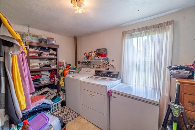 703 Winchester Rd, Dewitt, NY 13057 - laundry room with separate washer and dryer