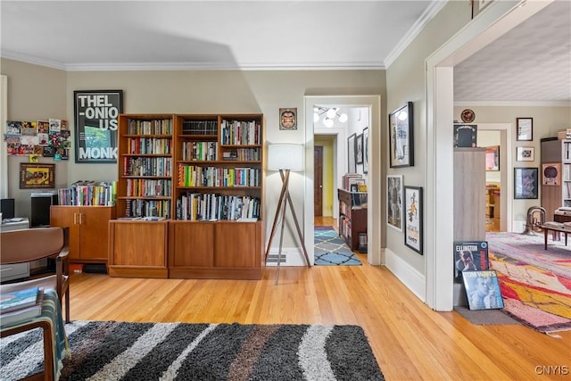 151 Edgehill Rd, Syracuse, NY 13224 - living area featuring wood finished floors, crown molding, and an office area