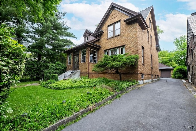 151 Edgehill Rd, Syracuse, NY 13224 - view of property exterior featuring brick siding and a detached garage