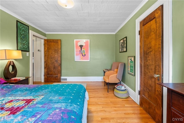 151 Edgehill Rd, Syracuse, NY 13224 - bedroom with ornamental molding and wood finished floors