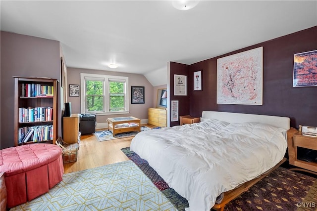 151 Edgehill Rd, Syracuse, NY 13224 - bedroom with wood finished floors and vaulted ceiling