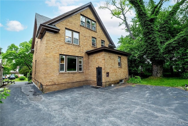 151 Edgehill Rd, Syracuse, NY 13224 - rear view of house featuring brick siding