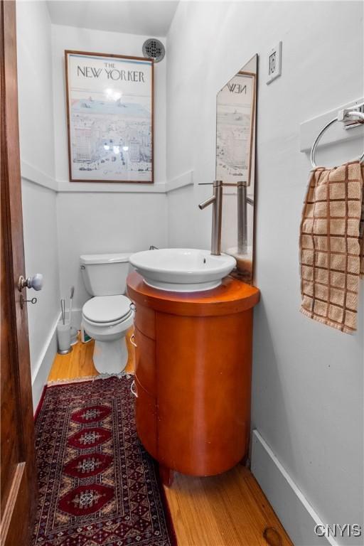 151 Edgehill Rd, Syracuse, NY 13224 - half bath with vanity and wood finished floors