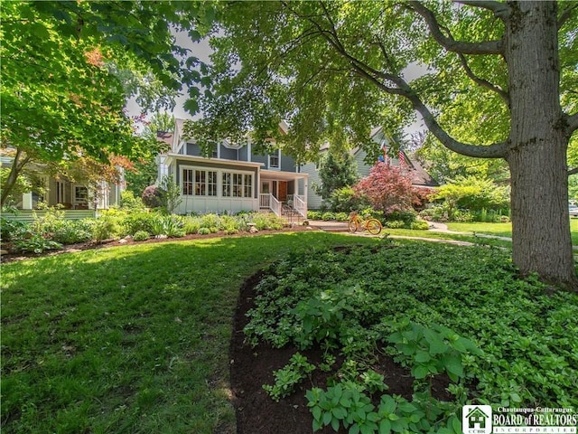 41 Vincent Ave, Chautauqua, NY 14722 - view of green lawn featuring a sunroom